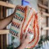 Handwoven Li brocade handbag with traditional geometric weave