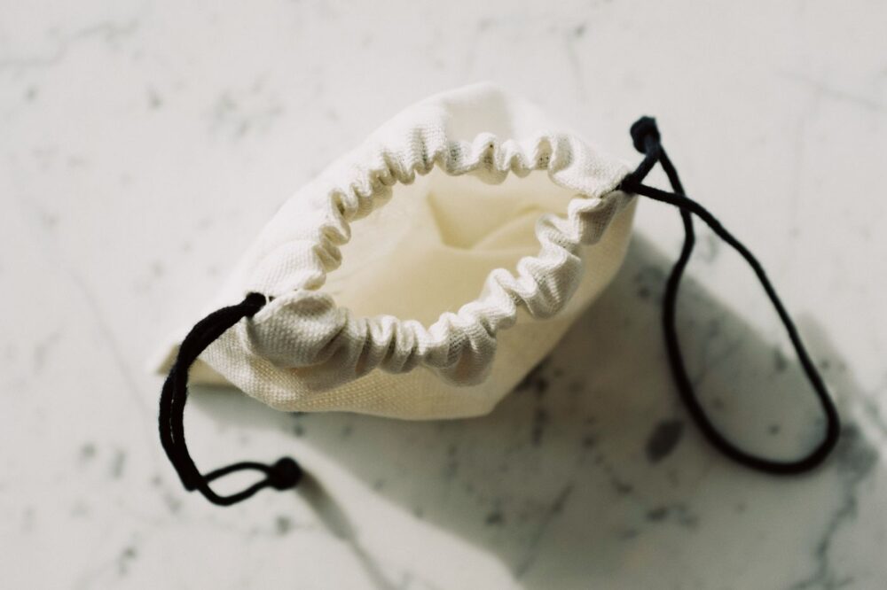 Small natural fibre drawstring sachet pouch