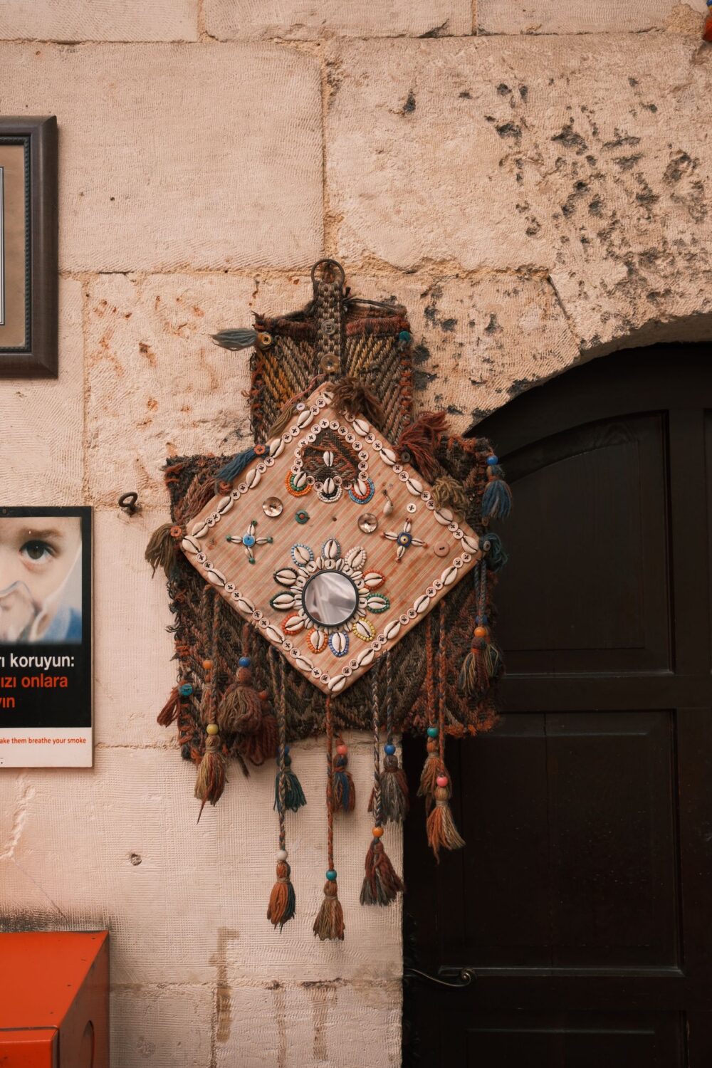 Traditional patterned wall hanging with embroidered detail